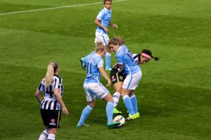 Isobel Christiansen and Daphne Corboz up against Desiree Scott of Notts County Ladies