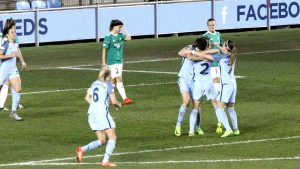 Lucy Bronze celebrates her goal against Fortuna Hjorring with Jill Scott and Kosovare Asllani