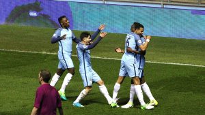 Thierry Amrose, Brahim Diaz, and Lukas Nmecha congratulate Rodney Kongolo's goal