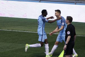 Charlie Oliver celebrates putting Man City in the lead against Southamton U23 with Rodney Kongolo