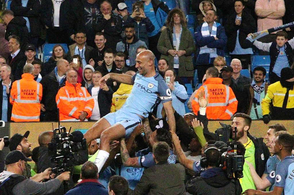 Pablo Zabaleta gets the bumps on his last Man City appearance at the Etihad