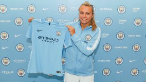 Claire Emslie with her new Man City Women shirt