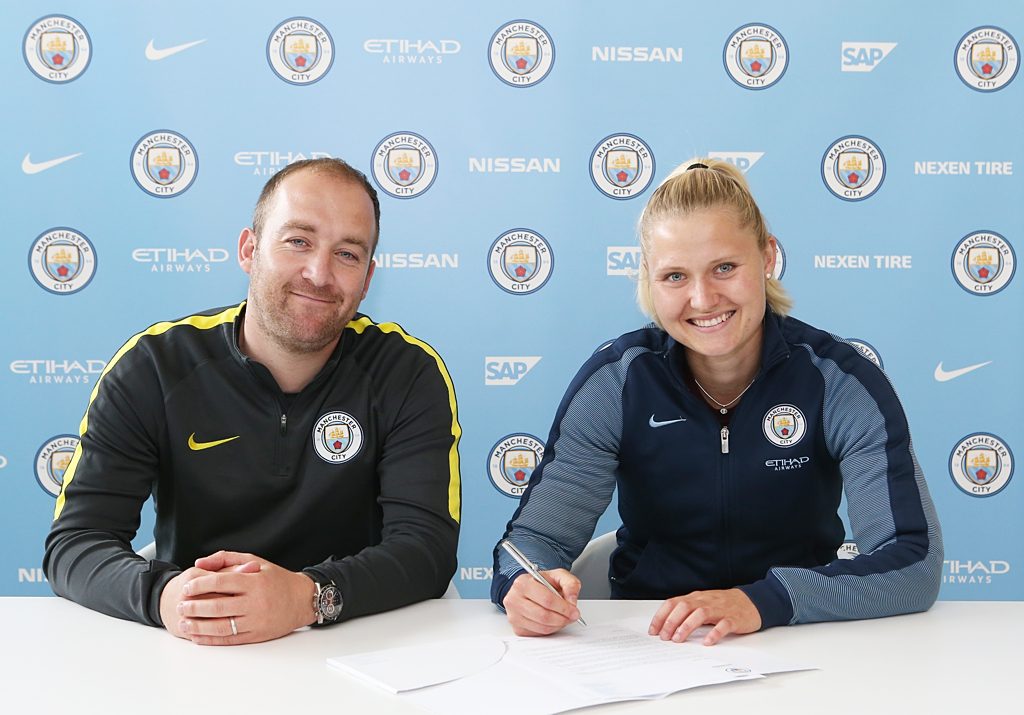 Nick Cushing watches Mie Jans sign for Manchester City Women