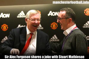 Sir Alex Ferguson shares a joke with Stuart Mathieson upon his retirement from the Manchester Evening News