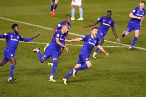 Luke Garbutt celebrates his free kick goal with his Everton U21 team mates