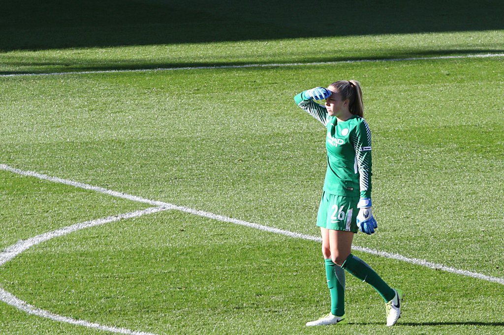 Ellie Roebuck shields her eyes from the low sun during Manchester City Women's game against Birmingham City Ladies