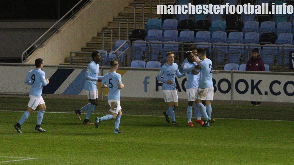 Manchester City EDS player Rabbi Matondo, third from the right, celebrates his goal with Charlie Oliver (number 2), right.