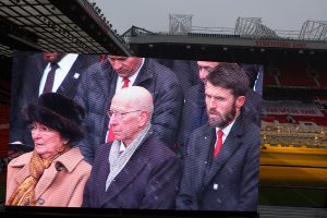 Lady Norma Charlton, Sir Bobby Charlton, and Manchester United club captain Michael Carrick at the Munich 60th Anniversary Service at Old Trafford