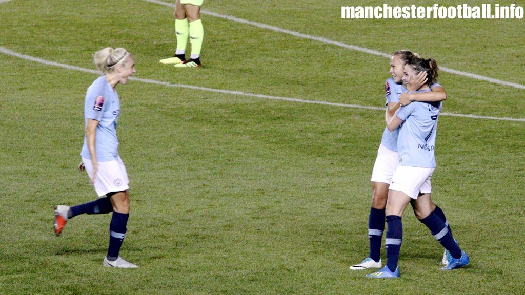 Steph Houghton runs over to celebrate a goal against Barcelona with Claire Emslie and goalscorer Mel Lawley
