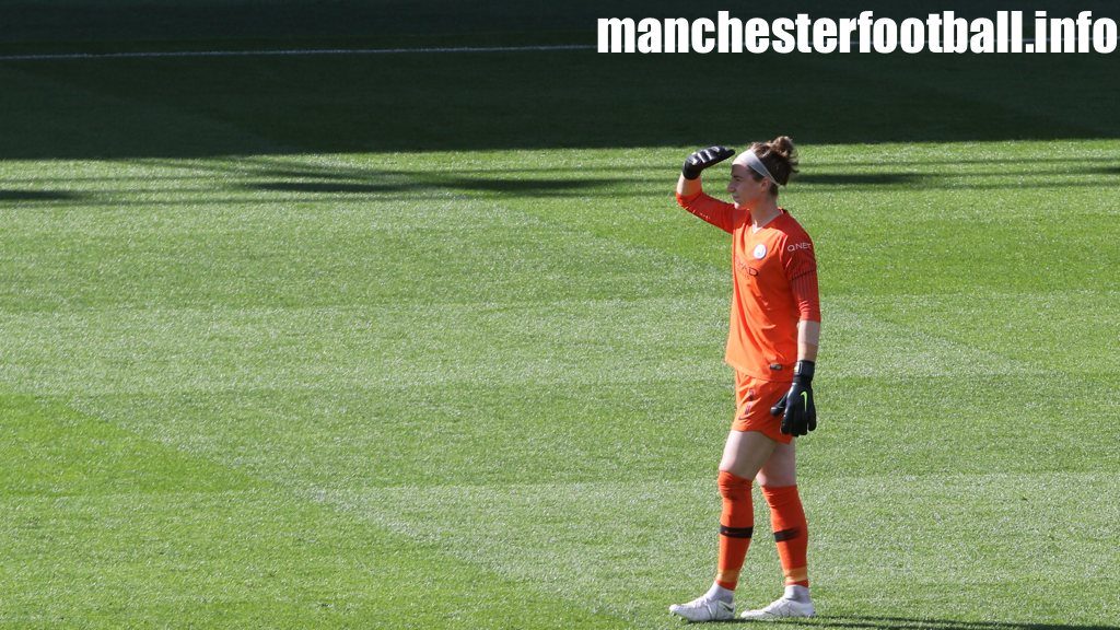 Karen Bardsley shielding her eyes against the sun