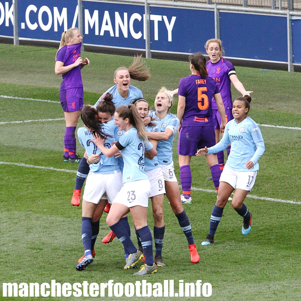 Manchester City players celebrate Jen Beattie's injury time winner against Liverpool Women on Sunday, March 31 2019