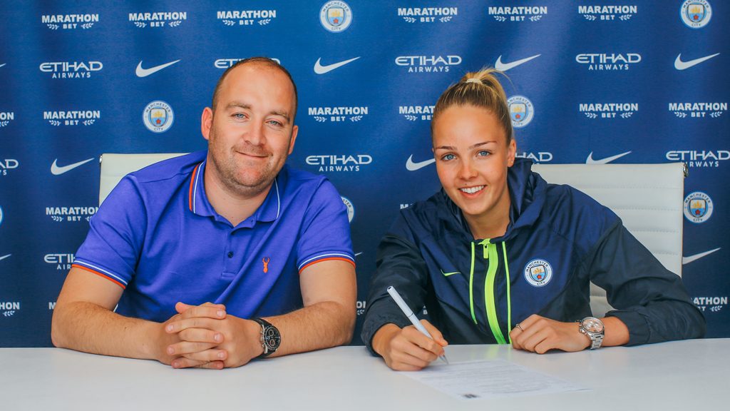 Manchester City women's manager Nick Cushing with Ellie Roebuck