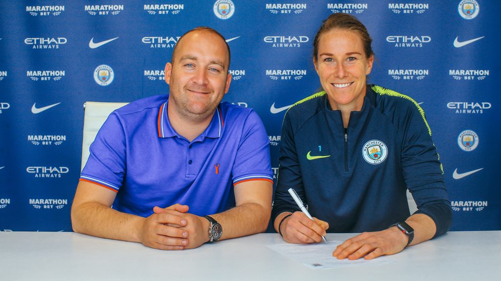 Manchester City women's manager Nick Cushing with Karen Bardsley