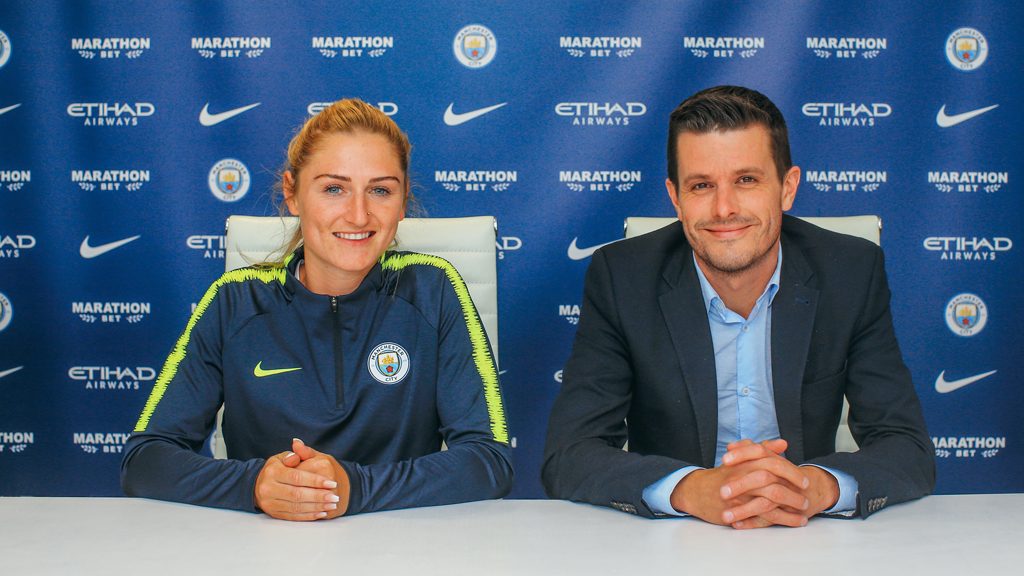 Laura Coombs with Head of Women's Football Gavin Makel