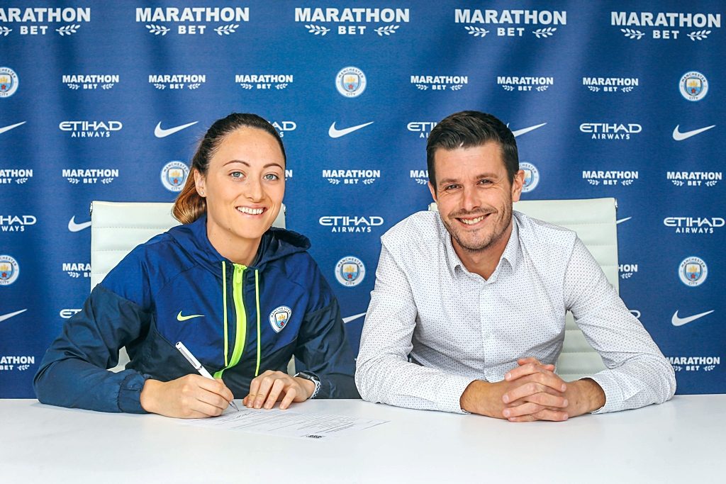 Megan Campbell with Gavin Makel, Head of Women's Football at Manchester City