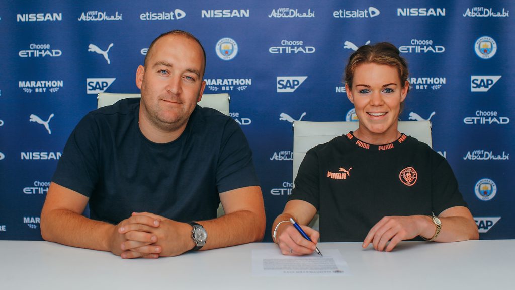 Nick Cushing and Aoife Mannion as she signs her contract with the club