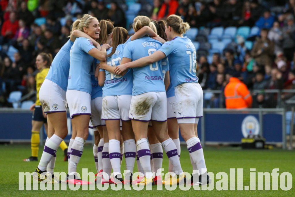 Manchester City players celebrate Lauren Hemp's goal to double Manchester City's lead over Arsenal at the CFA on Sunday, February 2 2020