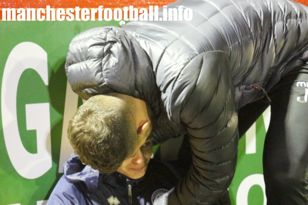 Manager Jack Pritchard embraces injured Oli Grey - - Hyde United 2, Stockport County 1 - FA Youth Cup