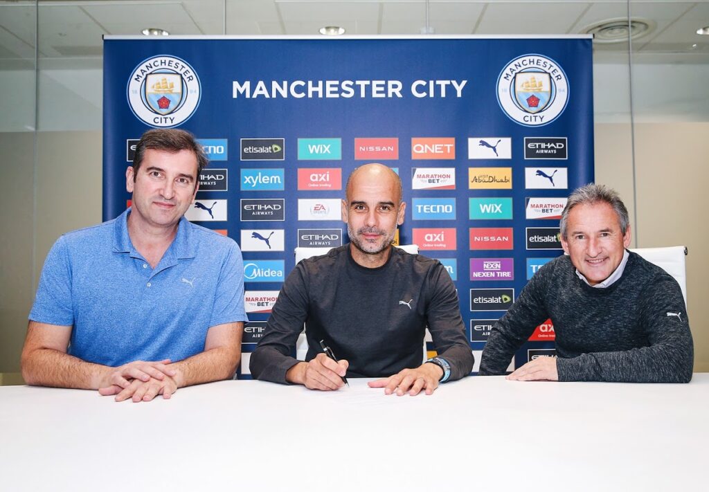 Pep Guardiola flanked by Ferran Soriano and Txiki Begiristain - new Manchester City contract until 2023