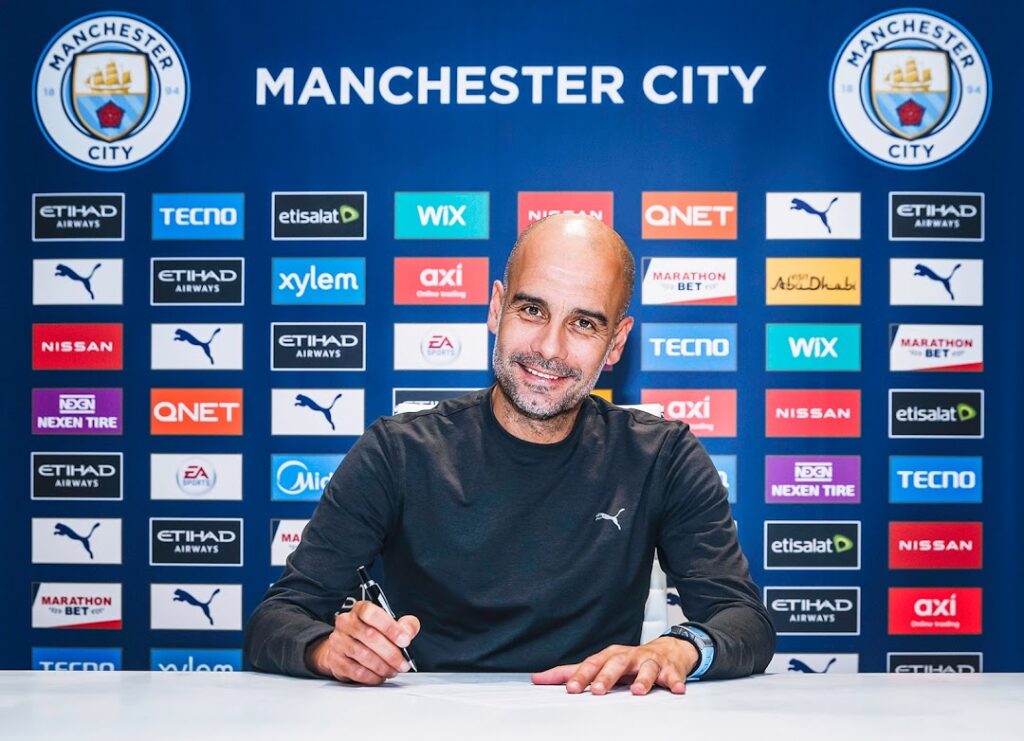 Pep Guardiola signs new contract to stay at Manchester City until 2023