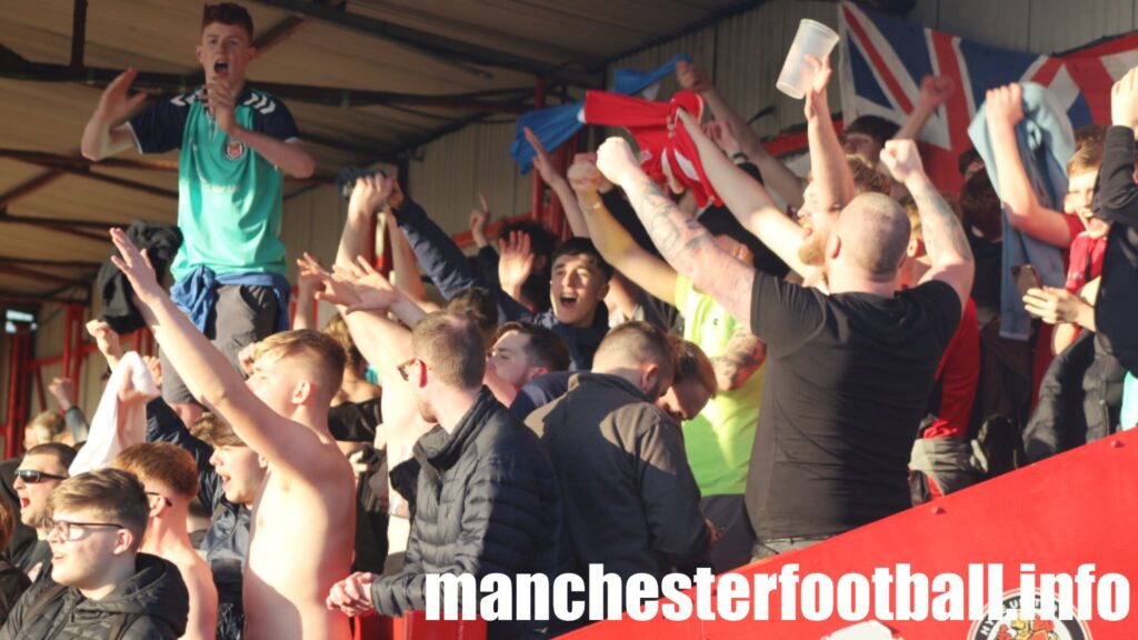 Fans in The Shed celebrating the Hyde United win against Witton Albion - Sunday March 20 2022