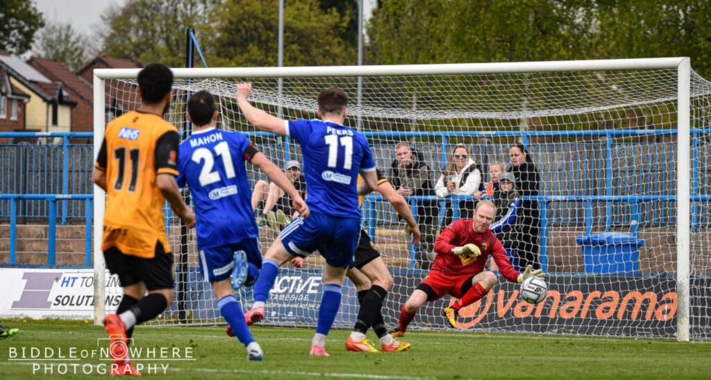 Tom Peers shot on the turn saved by Jake Weaver - Curzon Ashton - Picture by Biddle of Nowhere Photography