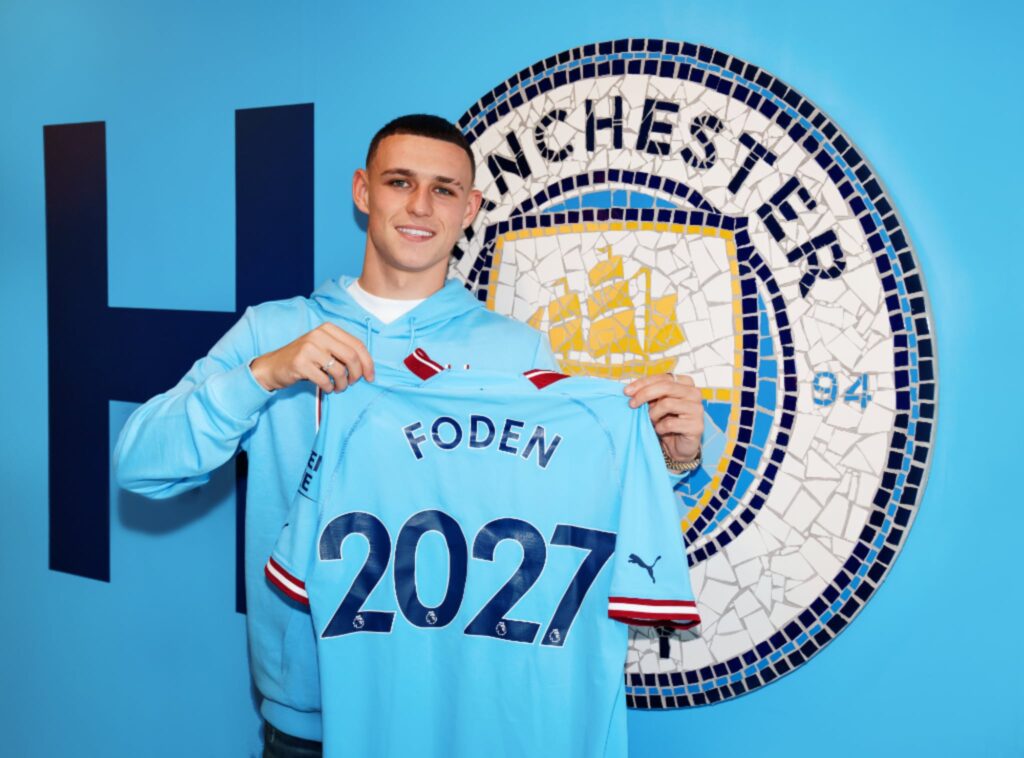 Phil Foden celebrates new contract with Manchester City