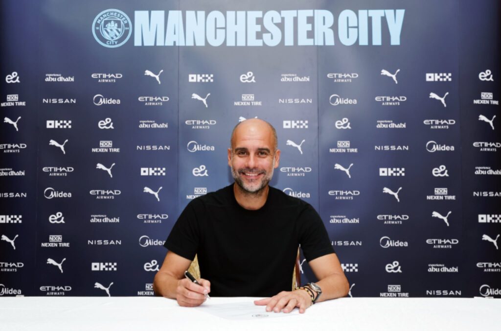 Pep Guardiola signs new contract until summer 2025
