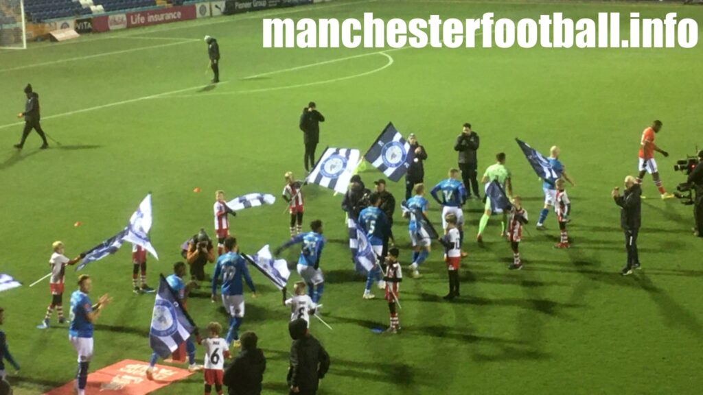 Cheadle Town U11 flag bearers at Stockport County