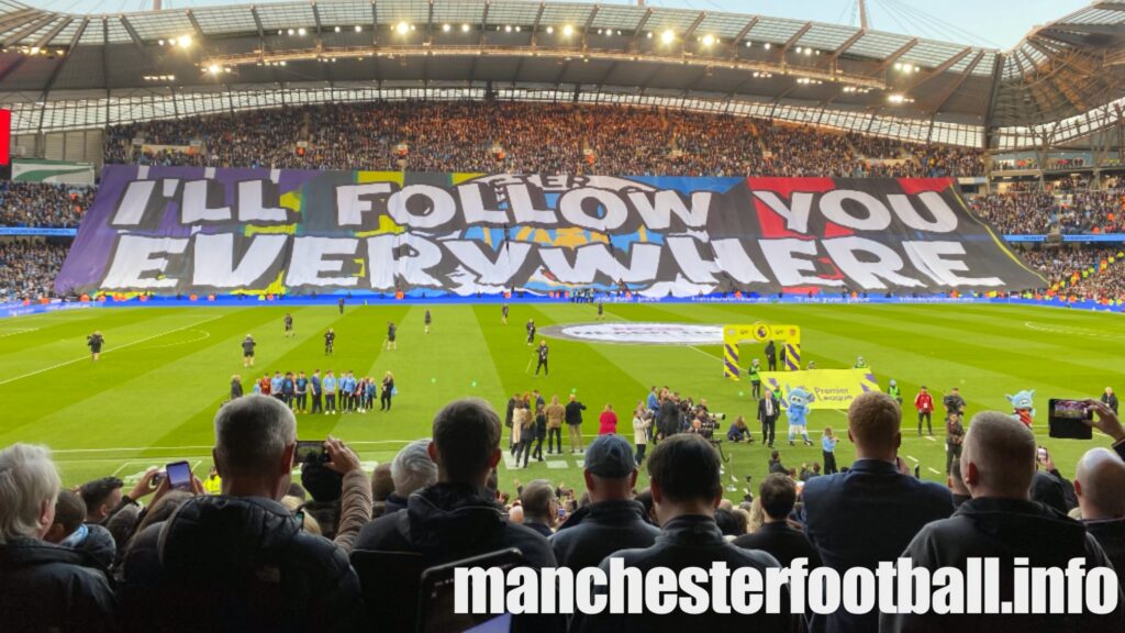 Manchester City vs Arsenal - I'll follow you everywhere banner at the Etihad Stadium
