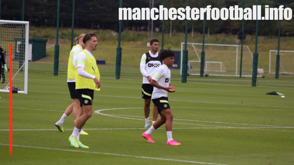 Manchester City's Jack Grealish and Rico Lewis